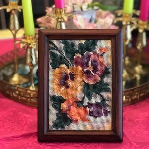 Framed needlepoint pansy artwork